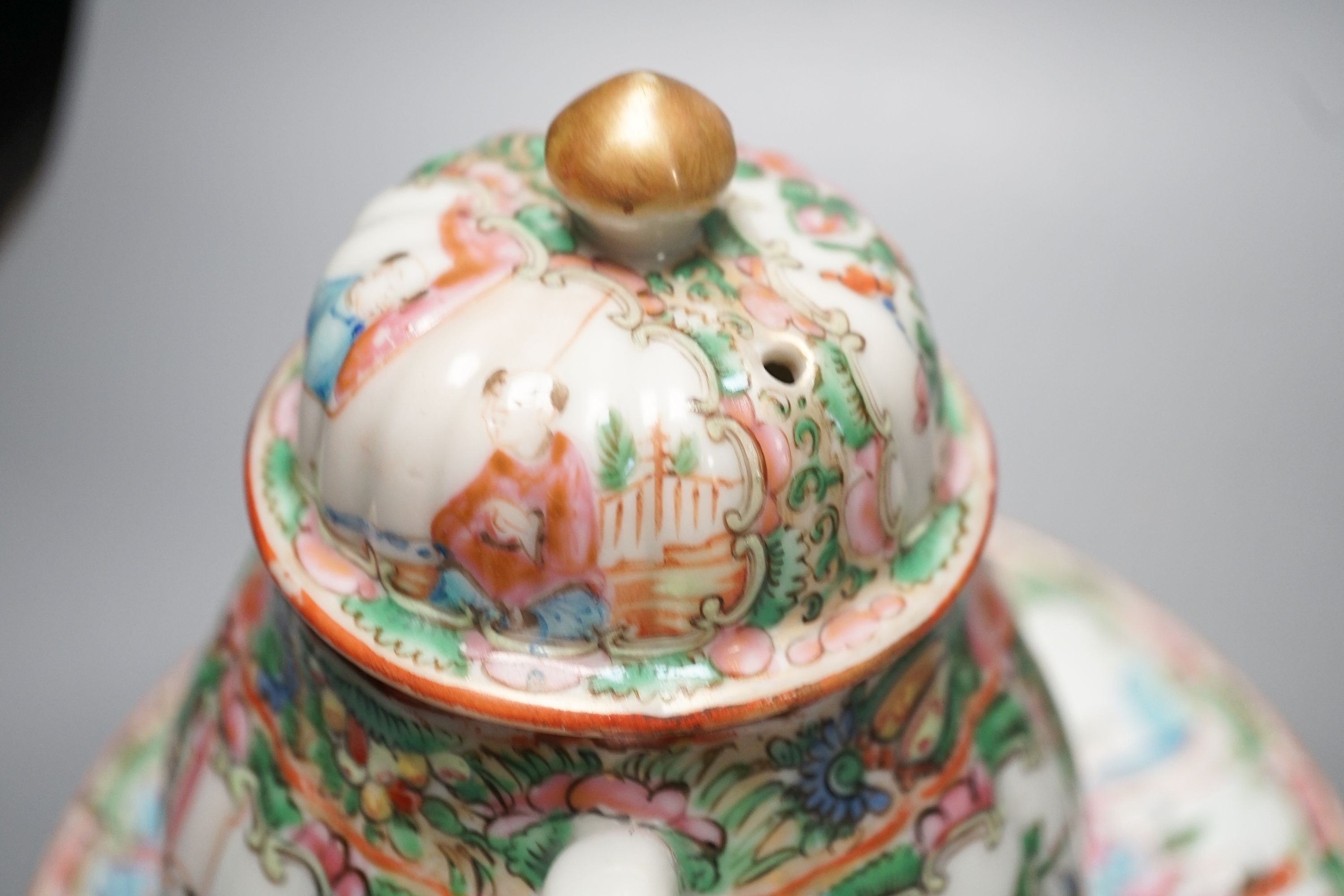 A 19th century Chinese famille rose teapot, sugar bowl, saucer dish vase and a similar yellow ground ‘dragon’ vase and cover 21cm